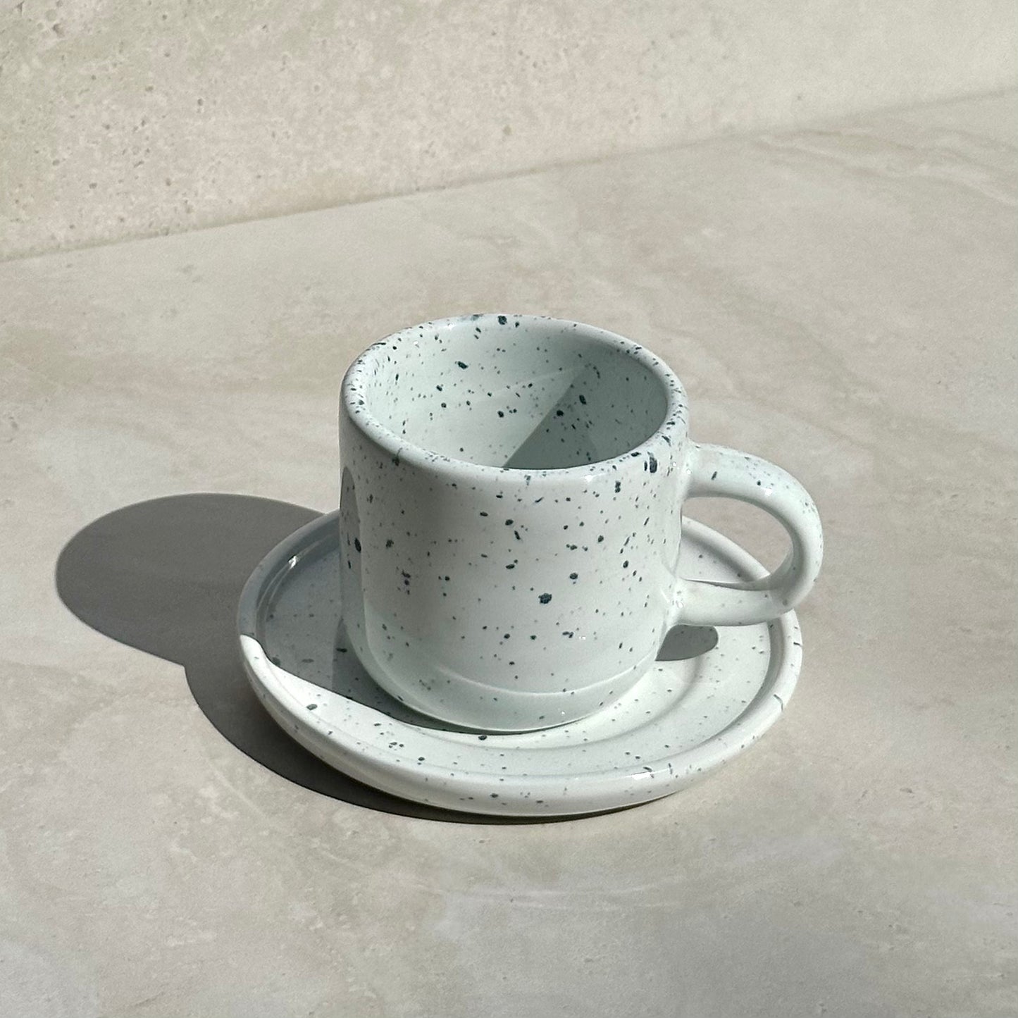 Nora Mug and Saucer - White Granite